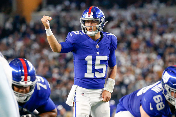 ARLINGTON, TX - NOVEMBER 12: New York Giants quarterback Tommy DeVito (15) signals at the line of scrimmage during the game between the Dallas Cowboys and New York Giants on November 12, 2023 at AT&T Stadium in Arlington, TX. (Photo by Andrew Dieb/Icon Sportswire)