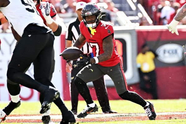 Jan 5, 2025; Tampa, Florida, USA; Tampa Bay Buccaneers running back Bucky Irving (7) runs the ball in the first quarter against the New Orleans Saints at Raymond James Stadium. Mandatory Credit: Jonathan Dyer-Imagn Images