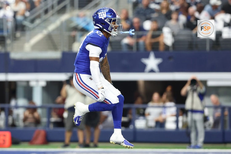Sep 14, 2025; Arlington, Texas, USA; New York Giants wide receiver Wan'Dale Robinson (17) reacts after a catch against the Dallas Cowboys during the first quarter at AT&T Stadium. Credit: Kevin Jairaj-Imagn Images