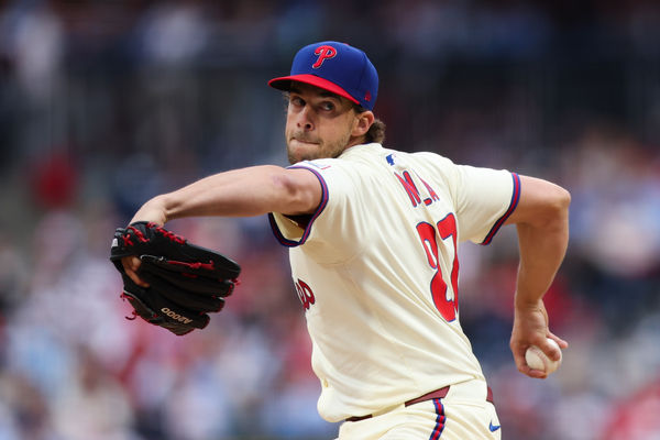 Apr 5, 2025; Philadelphia, Pennsylvania, USA; Philadelphia Phillies pitcher Aaron Nola (27) pitches against the Los Angeles Dodgers during the fourth inning at Citizens Bank Park. Mandatory Credit: Bill Streicher-Imagn Images