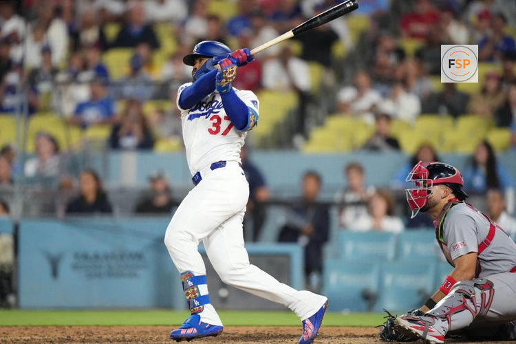 Sep 3, 2026; Los Angeles, California, USA;  Los Angeles Dodgers outfielder Teoscar Hernandez (37) hits a two run RBI double against St. Louis Cardinals pitcher Riley O'Brien (not pictured) and catcher Leo Bernal (13) to win the game in the ninth inning at Dodger Stadium.  Credit: Kirby Lee-Imagn Images