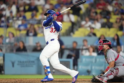 Sep 3, 2026; Los Angeles, California, USA;  Los Angeles Dodgers outfielder Teoscar Hernandez (37) hits a two run RBI double against St. Louis Cardinals pitcher Riley O'Brien (not pictured) and catcher Leo Bernal (13) to win the game in the ninth inning at Dodger Stadium.  Mandatory Credit: Kirby Lee-Imagn Images