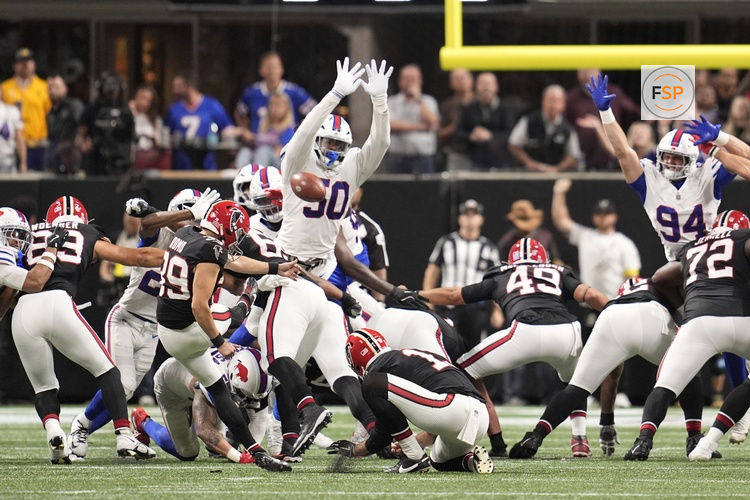 Oct 13, 2025; Atlanta, Georgia, USA; Buffalo Bills defensive end Greg Rousseau (50) goes up to block the field goal attempt by Atlanta Falcons kicker Parker Romo (39) during the second half of a game at Mercedes-Benz Stadium. Credit: Dale Zanine-Imagn Images