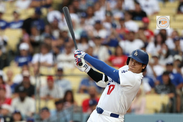 Sep 7, 2026; Los Angeles, California, USA;  Los Angeles Dodgers designated hitter Shohei Ohtani (17) flies out to left field against Cincinnati Reds starting pitcher Chase Burns (not pictured) during the first inning at Dodger Stadium.  Credit: Kiyoshi Mio-Imagn Images