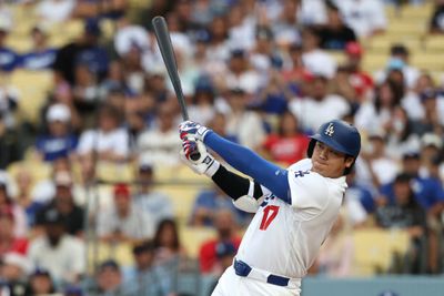 Sep 7, 2026; Los Angeles, California, USA;  Los Angeles Dodgers designated hitter Shohei Ohtani (17) flies out to left field against Cincinnati Reds starting pitcher Chase Burns (not pictured) during the first inning at Dodger Stadium.  Mandatory Credit: Kiyoshi Mio-Imagn Images