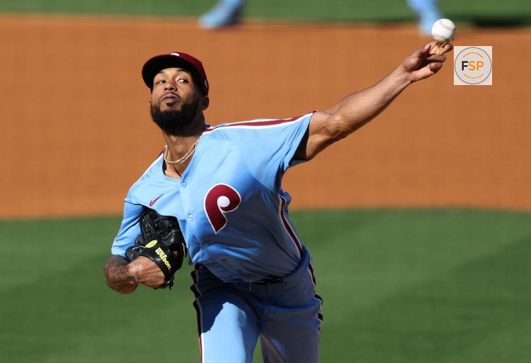 Oct 9, 2025; Los Angeles, California, USA; Philadelphia Phillies pitcher Cristopher Sanchez (61) throws in the second inning against the Los Angeles Dodgers during game four of the NLDS round for the 2025 MLB playoffs at Dodger Stadium. Credit: Kiyoshi Mio-Imagn Images