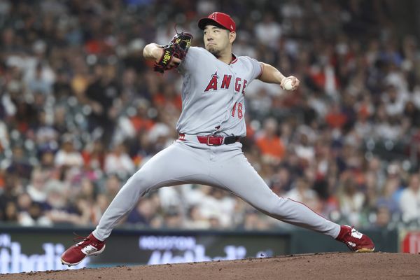 Mar 27, 2026; Houston, Texas, USA; Los Angeles Angels starting pitcher Yusei Kikuchi (16) delivers a pitch during the first inning against the Houston Astros at Daikin Park. Mandatory Credit: Troy Taormina-Imagn Images