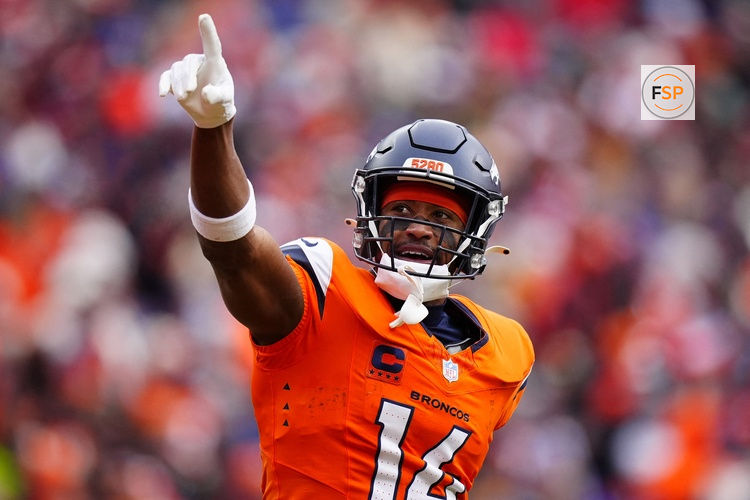 Jan 25, 2026; Denver, CO, USA; Denver Broncos wide receiver Courtland Sutton (14) reacts after catching a touchdown pass against the New England Patriots during the first half in the 2026 AFC Championship Game at Empower Field at Mile High. Credit: Ron Chenoy-Imagn Images