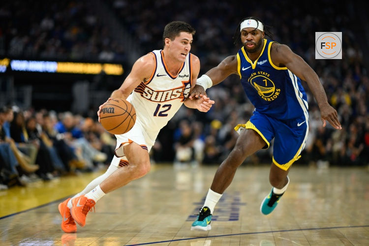 Nov 4, 2025; San Francisco, California, USA; Phoenix Suns guard Collin Gillespie (12) dribbles against Golden State Warriors guard Buddy Hield (7) in the second quarter at Chase Center. Credit: Eakin Howard-Imagn Images