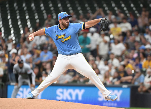 Aug 16, 2024; Milwaukee, Wisconsin, USA; Milwaukee Brewers pitcher Aaron Civale (32) delivers a pitch against the Cleveland Guardians in the first inning at American Family Field. Mandatory Credit: Michael McLoone-USA TODAY Sports