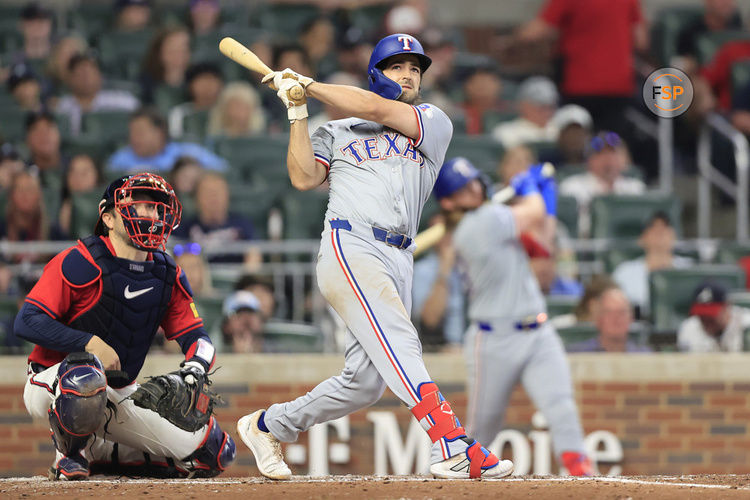 ATLANTA, GA - APRIL 19: Texas Rangers third baseman Josh Smith (8) bats during the Friday evening MLB game between the defending World Champion Texas Rangers and the Atlanta Braves on April 19, 2024 at Truist Park in Atlanta, Georgia(Photo by David J. Griffin/Icon Sportswire)