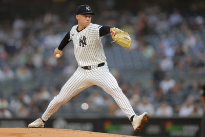 Jun 17, 2025; Bronx, New York, USA; New York Yankees starting pitcher Will Warren (98) pitches against the Los Angeles Angels during the first inning at Yankee Stadium. Mandatory Credit: Brad Penner-Imagn Images