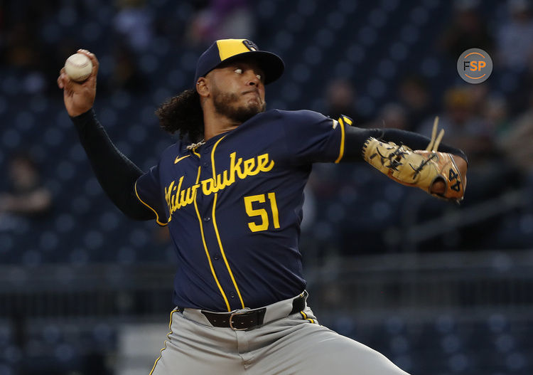 Sep 25, 2024; Pittsburgh, Pennsylvania, USA;  Milwaukee Brewers starting pitcher Freddy Peralta (51) delivers a pitch against the Pittsburgh Pirates during the first inning at PNC Park. Credit: Charles LeClaire-Imagn Images