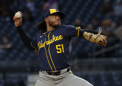 Sep 25, 2024; Pittsburgh, Pennsylvania, USA;  Milwaukee Brewers starting pitcher Freddy Peralta (51) delivers a pitch against the Pittsburgh Pirates during the first inning at PNC Park. Mandatory Credit: Charles LeClaire-Imagn Images