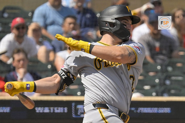 Jul 13, 2025; Minneapolis, Minnesota, USA; Pittsburgh Pirates infielder Spencer Horwitz (2) drives in the winning run against the Minnesota Twins on a fielder’s choice during the ninth inning at Target Field. Credit: Nick Wosika-Imagn Images
