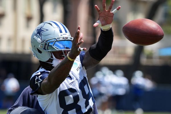 Jul 26, 2025; Oxnard, CA, USA; Dallas Cowboys receiver CeeDee Lamb (88) catches the ball at training camp at the River Ridge Fields. Mandatory Credit: Kirby Lee-Imagn Images