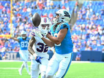 Aug 24, 2024; Orchard Park, New York, USA; Carolina Panthers wide receiver Jalen Coker (18) catches a pass for a touchdown  over Buffalo Bills cornerback Kyron Brown (32) in the fourth quarter pre-season game at Highmark Stadium. Mandatory Credit: Mark Konezny-USA TODAY Sports