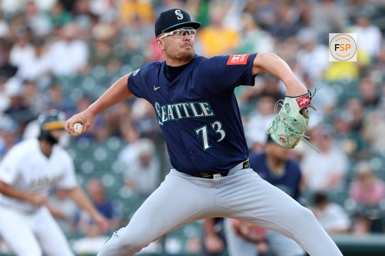 Jul 29, 2025; West Sacramento, California, USA; Seattle Mariners starting pitcher Logan Evans (73) throws a pitch against the Athletics during the first inning at Sutter Health Park. Credit: Dennis Lee-Imagn Images