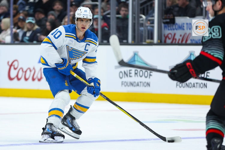 Mar 4, 2026; Seattle, Washington, USA; St. Louis Blues center Brayden Schenn (10) looks to shoot in the first period against the Seattle Kraken at Climate Pledge Arena. Credit: Kevin Ng-Imagn Images