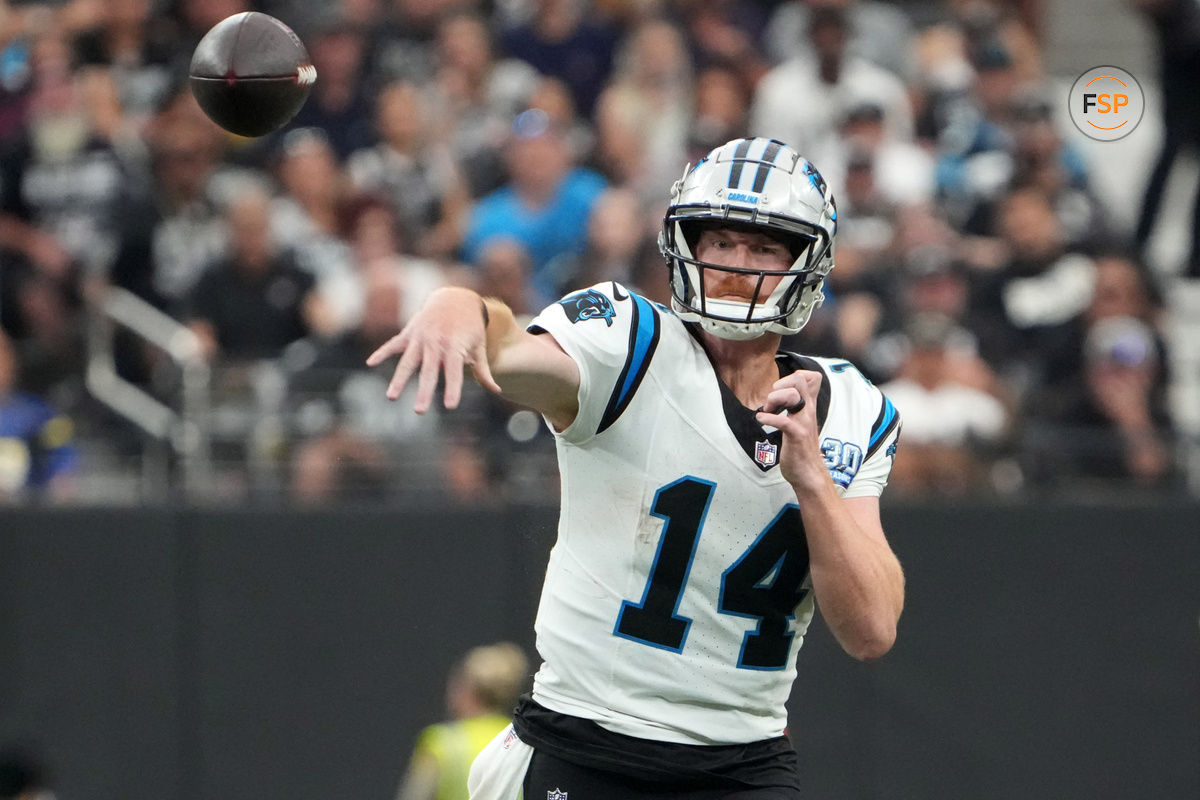 Sep 22, 2024; Paradise, Nevada, USA; Carolina Panthers quarterback Andy Dalton (14) throws the ball against the Las Vegas Raiders in the second half at Allegiant Stadium. Credit: Kirby Lee-Imagn Images