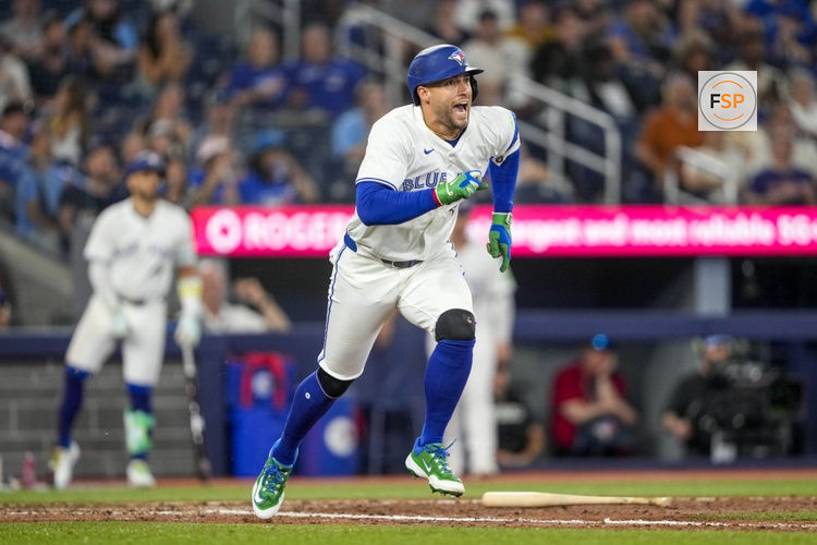 Jun 22, 2025; Toronto, Ontario, CAN; Toronto Blue Jays outfielder George Springer (4) hits a single during the ninth inning in their MLB game against the Chicago White Sox at Rogers Centre. Credit: Kevin Sousa-Imagn Images