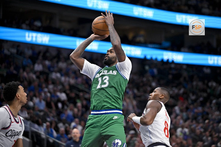 Mar 21, 2026; Dallas, Texas, USA; Dallas Mavericks forward Naji Marshall (13) makes a jump shot during the game between the Mavericks and the Clippers at American Airlines Center. Credit: Jerome Miron-Imagn Images