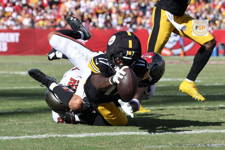 Oct 18, 2026; Tampa, Florida, USA;  Pittsburgh Steelers wide receiver Germie Bernard (17) scores a /td/ during overtime against the Tampa Bay Buccaneers at Raymond James Stadium.  Credit: Morgan Tencza-Imagn Images