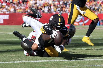 Oct 18, 2026; Tampa, Florida, USA;  Pittsburgh Steelers wide receiver Germie Bernard (17) scores a /td/ during overtime against the Tampa Bay Buccaneers at Raymond James Stadium.  Mandatory Credit: Morgan Tencza-Imagn Images