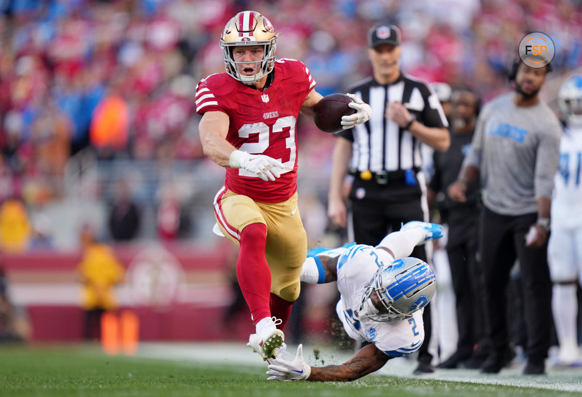 Jan 28, 2024; Santa Clara, California, USA; San Francisco 49ers running back Christian McCaffrey (23) runs with the ball against Detroit Lions safety C.J. Gardner-Johnson (2) during the first half of the NFC Championship football game at Levi's Stadium. Credit: Kyle Terada-USA TODAY Sports