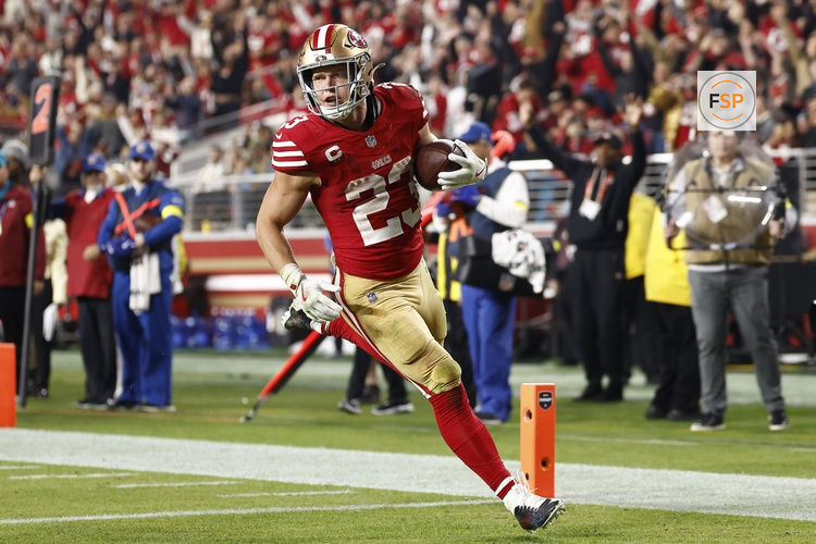 Nov 24, 2025; Santa Clara, California, USA; San Francisco 49ers running back Christian McCaffrey (23) rushes for a touchdown against the Carolina Panthers during the second half at Levi's Stadium. Credit: Kelley L Cox-Imagn Images