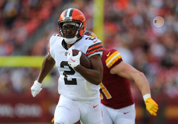 LANDOVER, MD - JANUARY 01: Cleveland Browns wide receiver Amari Cooper (2) hauls in a pass then rushes up field scoring a touchdown while eluding Washington Commanders linebacker David Mayo (51) during the Cleveland Browns game versus the Washington Commanders on January 01, 2023, at FedEx Field in Landover, MD. (Photo by Lee Coleman/Icon Sportswire)