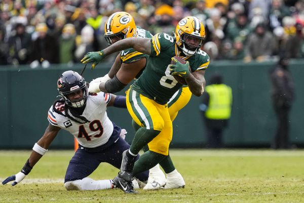 Jan 5, 2025; Green Bay, Wisconsin, USA;  Green Bay Packers running back Josh Jacobs (8) during the game against the Chicago Bears at Lambeau Field. Mandatory Credit: Jeff Hanisch-Imagn Images