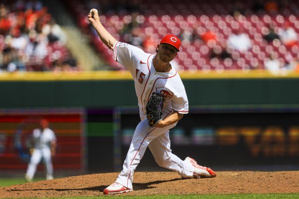 Apr 30, 2026; Cincinnati, Ohio, USA; Cincinnati Reds relief pitcher Emilio Pagan (15) pitches against the Colorado Rockies in the ninth inning at Great American Ball Park. Mandatory Credit: Katie Stratman-Imagn Images