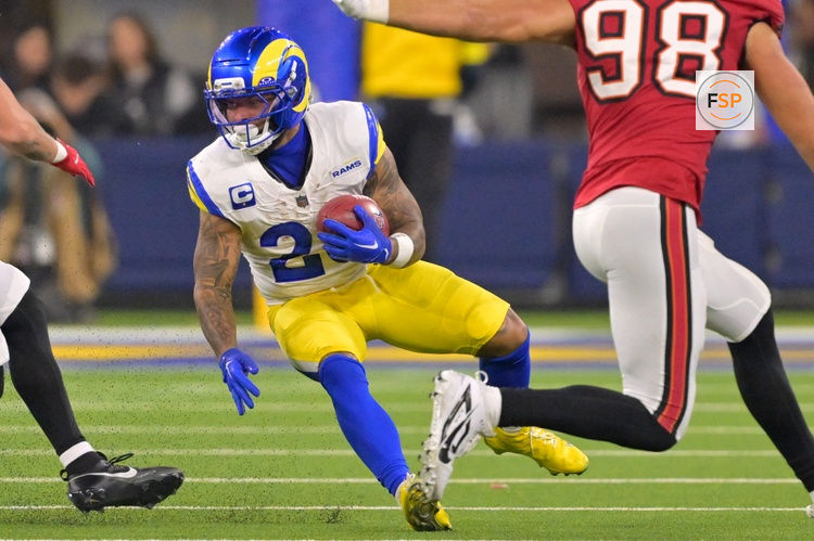 Nov 23, 2025; Inglewood, California, USA; Los Angeles Rams running back Blake Corum (22) carries the ball against the Tampa Bay Buccaneers at SoFi Stadium. Credit: Jayne Kamin-Oncea-Imagn Images