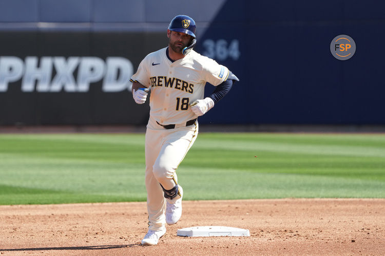 Feb 26, 2025; Phoenix, Arizona, USA; Milwaukee Brewers third base Vinny Capra (18) rounds the bases after hitting a home run against the Los Angeles Dodgers during the first inning at American Family Fields of Phoenix. Credit: Rick Scuteri-Imagn Images