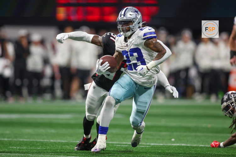 Nov 3, 2024; Atlanta, Georgia, USA; Dallas Cowboys running back Rico Dowdle (23) runs the ball against the Atlanta Falcons in the fourth quarter at Mercedes-Benz Stadium. Credit: Brett Davis-Imagn Images