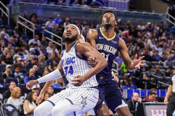 Oct 16, 2025; Orlando, Florida, USA; Orlando Magic center Wendell Carter Jr. (34) and New Orleans Pelicans center Yves Missi (21) look for the rebound during the second half at Kia Center. Mandatory Credit: Mike Watters-Imagn Images