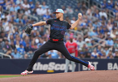 Jul 4, 2025; Toronto, Ontario, CAN; Toronto Blue Jays pitcher Eric Lauer (56) throws a pitch against the Los Angeles Angels during the first inning at Rogers Centre. Mandatory Credit: Nick Turchiaro-Imagn Images