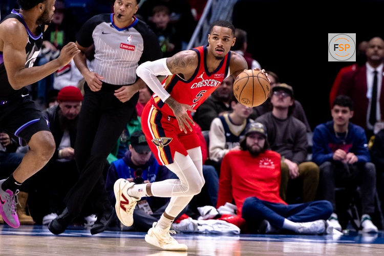 Jan 20, 2025; New Orleans, Louisiana, USA;  New Orleans Pelicans guard Dejounte Murray (5) brings the ball up court against the Utah Jazz during the first half at Smoothie King Center. Credit: Stephen Lew-Imagn Images