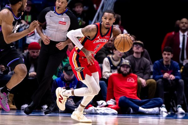 Jan 20, 2025; New Orleans, Louisiana, USA;  New Orleans Pelicans guard Dejounte Murray (5) brings the ball up court against the Utah Jazz during the first half at Smoothie King Center. Mandatory Credit: Stephen Lew-Imagn Images