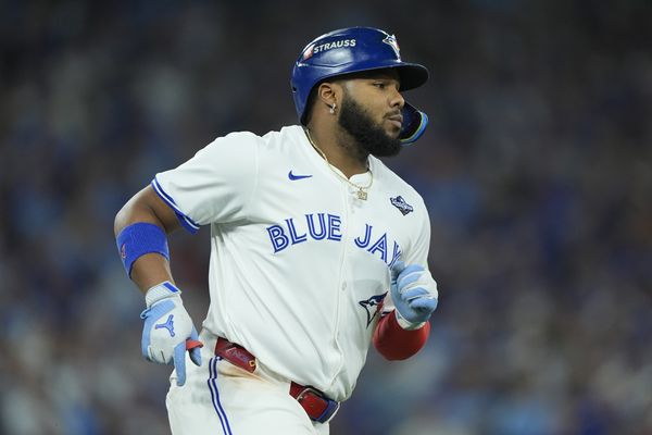 Nov 1, 2025; Toronto, Ontario, CAN; Toronto Blue Jays first baseman Vladimir Guerrero Jr. (27) walks to first base in the third inning against the Los Angeles Dodgers during game seven of the 2025 MLB World Series at Rogers Centre. Mandatory Credit: John E. Sokolowski-Imagn Images