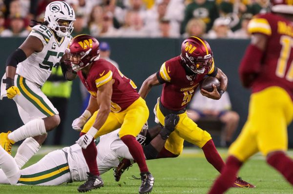 Washington Commanders quarterback Jayden Daniels (5) is sacked by Green Bay Packers defensive tackle Devonte Wyatt (95) on Thursday, September 11, 2025, at Lambeau Field in Green Bay, Wis. The Packers won the game, 27-18.
Tork Mason/USA TODAY NETWORK-Wisconsin