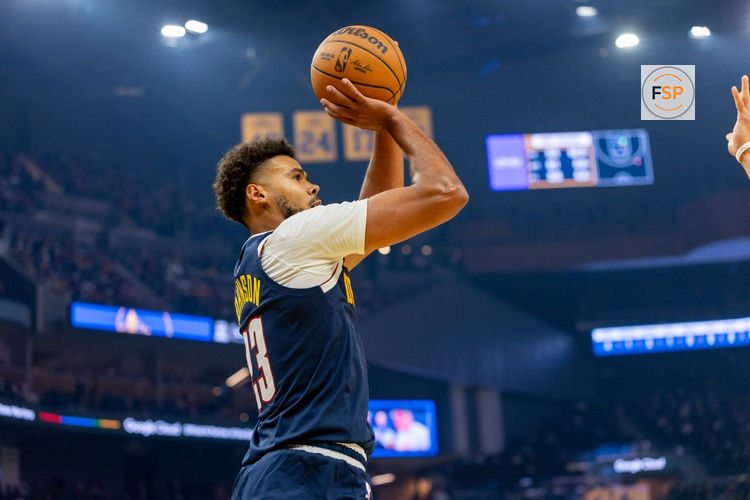 Oct 23, 2025; San Francisco, California, USA;  Denver Nuggets forward Cameron Johnson (23) puts up a shot against the Golden State Warriors during the first quarter at Chase Center. Credit: Bob Kupbens-Imagn Images