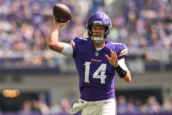 Aug 10, 2024; Minneapolis, Minnesota, USA; Minnesota Vikings quarterback Sam Darnold (14) throws a pass against the Las Vegas Raiders during the first quarter at U.S. Bank Stadium. Mandatory Credit: Jeffrey Becker-USA TODAY Sports