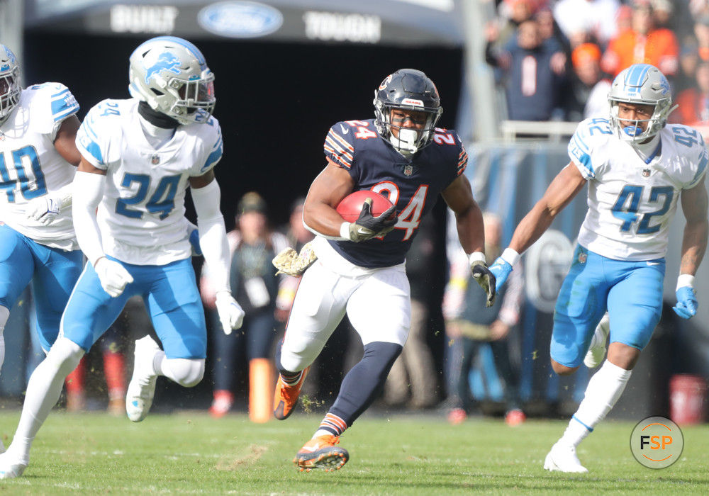 CHICAGO, IL - NOVEMBER 13: Chicago Bears running back Khalil Herbert (24) runs the ball up the field during a game between the Detroit Lions and the Chicago Bears on November 13, 2022 at Soldier Field in Chicago, IL. (Photo by Melissa Tamez/Icon Sportswire)