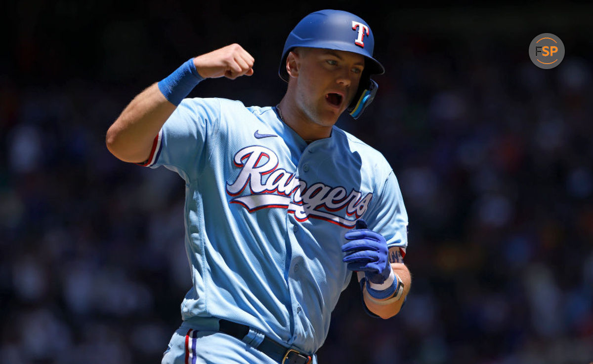 ARLINGTON, TX - APRIL 30: Josh Jung #6 of the Texas Rangers celebrates after hitting a grand slam home run against the New York Yankees during the first inning at Globe Life Field on April 30, 2023 in Arlington, Texas. (Photo by Ron Jenkins/Getty Images)