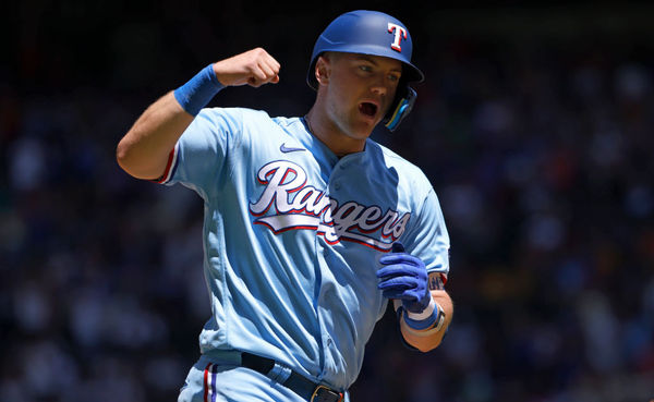 ARLINGTON, TX - APRIL 30: Josh Jung #6 of the Texas Rangers celebrates after hitting a grand slam home run against the New York Yankees during the first inning at Globe Life Field on April 30, 2023 in Arlington, Texas. (Photo by Ron Jenkins/Getty Images)