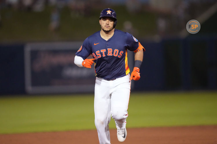 Mar 14, 2025; West Palm Beach, Florida, USA;  Houston Astros catcher Yainer Diaz (21) rounds the bases after hitting a two-run home run in the fifth inning against the Toronto Blue Jays at CACTI Park of the Palm Beaches. Credit: Jim Rassol-Imagn Images