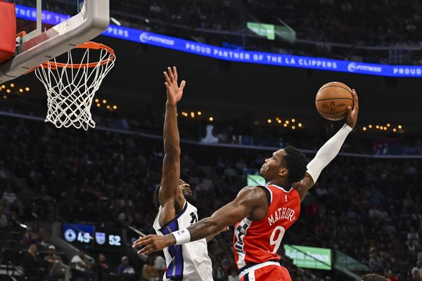 Mar 14, 2026; Inglewood, California, USA; LA Clippers guard-forward Bennedict Mathurin (9) dunks against Sacramento Kings forward Precious Achiuwa (9) during the second quarter at Intuit Dome. Mandatory Credit: Jonathan Hui-Imagn Images