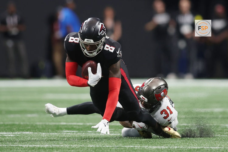 Sep 7, 2025; Atlanta, Georgia, USA; Tampa Bay Buccaneers safety Antoine Winfield Jr. (31) tackles Atlanta Falcons tight end Kyle Pitts Sr. (8) during the third quarter at Mercedes-Benz Stadium. Credit: Brett Davis-Imagn Images